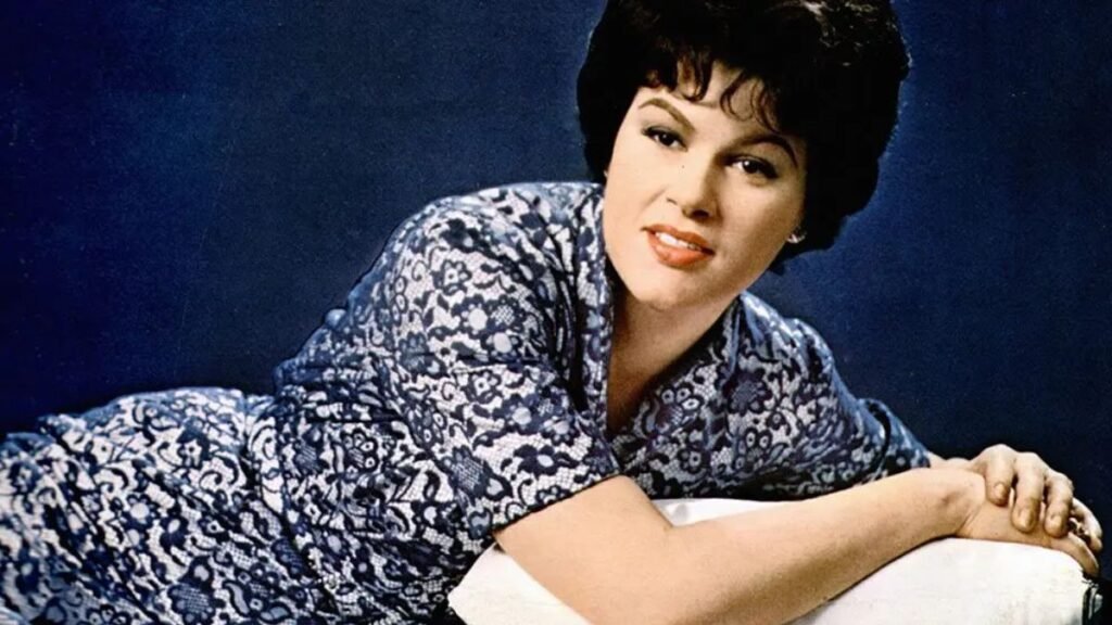 15 iconic country singers and their biggest hits